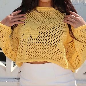 Women’s yellow cropped knit top
